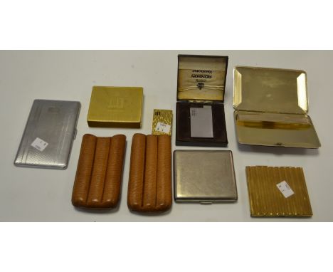 Smoking Interest - a gold coloured Dunhill bark effect lighter; a gold coloured Dunhill cigarette box holder; an EPNS cigaret