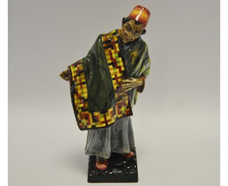 A Royal Doulton figure, Carpet seller, HN1464