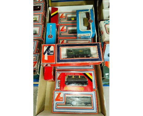 A Lima boxed locomotive 5108M WG and a selection of boxed trucks etc. 