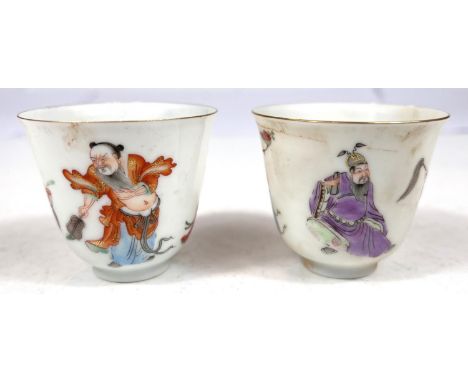 A pair of Chinese famille rose wine cups decorated with deities to the outside, seal mark to base height 5cm&nbsp; 