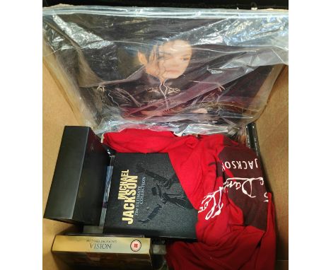 A collection of Michael Jackson collectables, T-Shirts, caps, DVD's, CD's etc. 