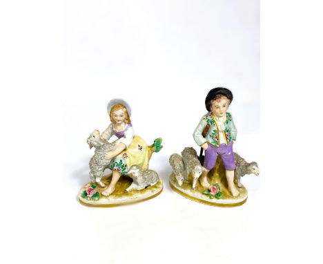 A pair of small Dresden figures:&nbsp; 18th century children with lambs, height 9.5cm 