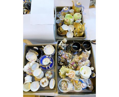 A collection of ceramic cups and saucers, various part sets, ceramic figures etc 