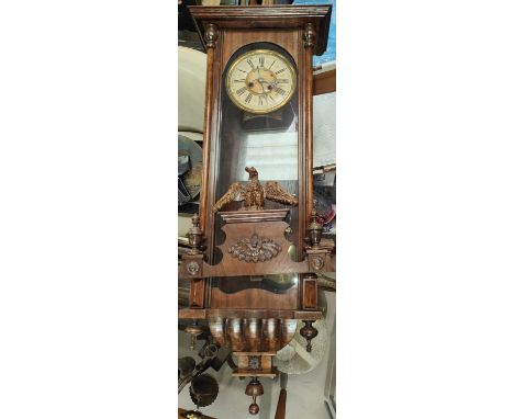 An early 20th century Vienna wall clock and two Napoleon cased mantel clocks 