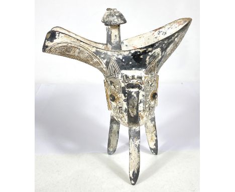 A Chinese burial ware 'Jue' ewer type stoneware item, ht. 25cm