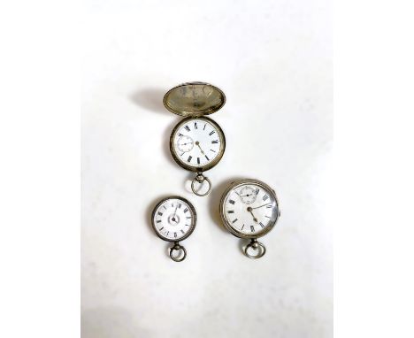 A silver cased hunter pocket watch (a.f.), another pocket watch and a lady's continental fob watch