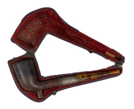 A 19th century meerschaum style pipe with a silver mounted amber stem, cased. 