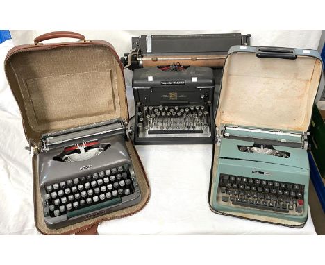An Imperial model 60 typewriter and two cased travel typewriters 