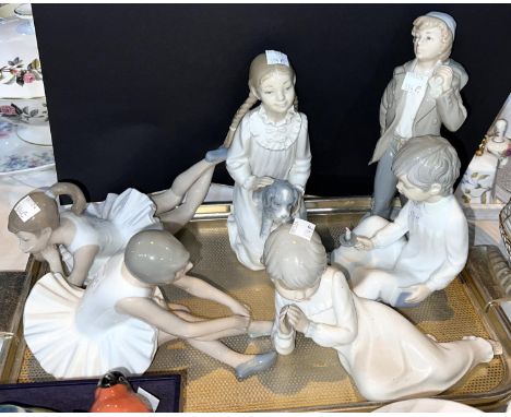 Six various Nao figures of children 