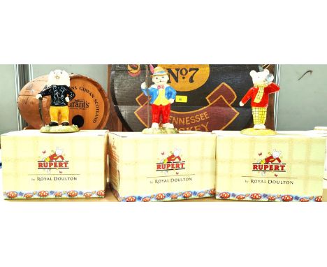 Four boxed Royal Doulton Rupert Bear figures, Algy Pug, Robin Hood, Ping-Pong Leading the Way, Edward Outlaw and another 