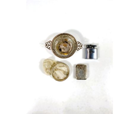 A hallmarked silver vesta case, monogrammed; a silver rimmed strainer; a pierced silver bonbon dish, 2.5oz; a lighter 