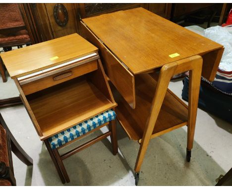 A mid century light oak drop leaf trolly with drip ends , a teak hall seat 