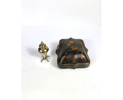 A hallmarked silver pair of dome top pepper pots on pedestal bases, cased, marks worn. An Art Nouveau pepper pot 0n 4 raised 