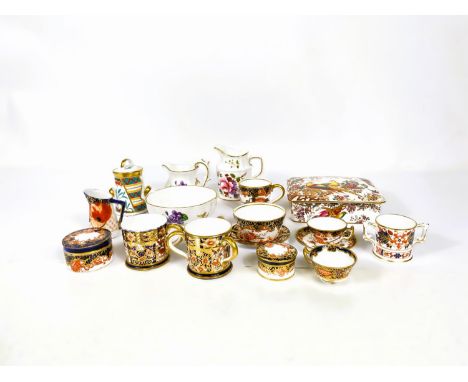 A collection of miniature Royal Crown Derby pieces, cups & saucers, tyg, etc. 