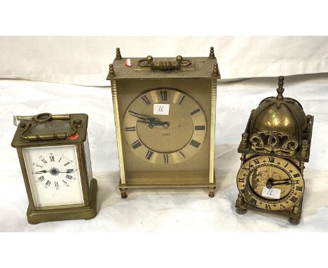 A 20th century brass carriage clock; a reproduction brass carriage clock; a period style brass mantel clock 