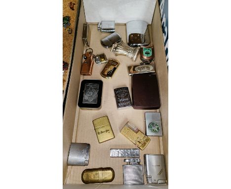 A Harley-Davidson cased zippo lighter, a jack Daniels zippo lighter and a collection of lighters 