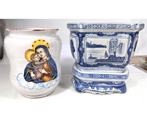 A modern Chinese blue and white planter on stand and an Italian Majolica stoneware jar 