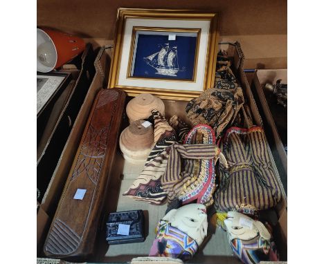 A pair of Indonesian puppet dolls; a Nigerian game, boxed; a framed silver ship; etc. 