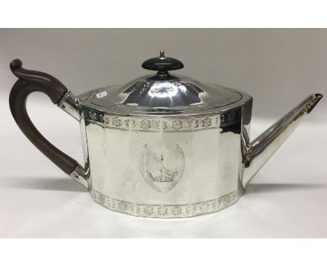 A good Georgian silver bright cut teapot of shaped form engraved with flowers and leaves. London 1786. By AE Ltd. Approx. 