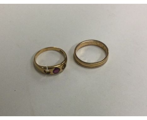 Two high carat gold ring mounts. Approx. 6 grams. Est. £100 - £150.
