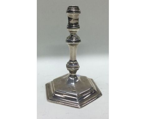 A good large George I silver taper stick. Circa 1715. By Benjamin Blakely. Punched thrice to base. Approx. 172 grams. Est. £6
