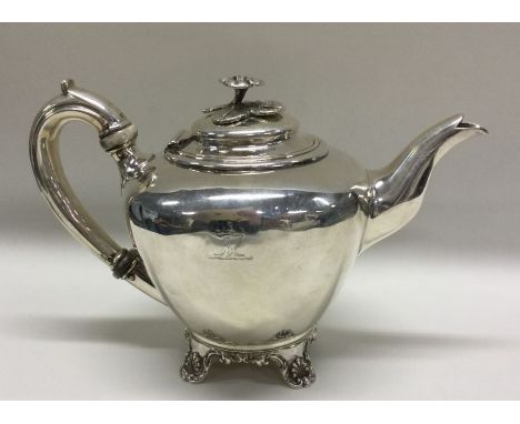 An attractive Victorian silver bachelor's teapot with crested side to flower finial. London. By RP&amp;CB. Approx. 213 grams.