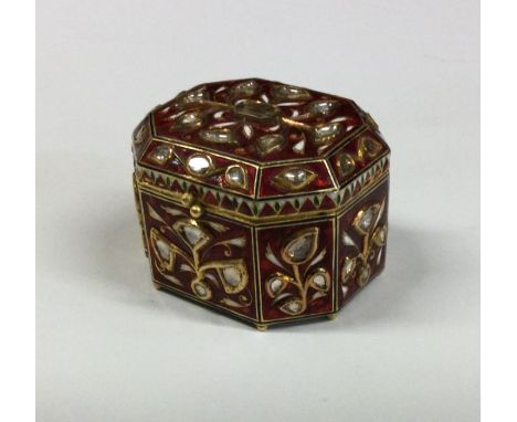 A heavy 21 carat gold Indian casket shaped pill box attractively decorated with red enamel and diamonds. Approx. 75 grams. Es