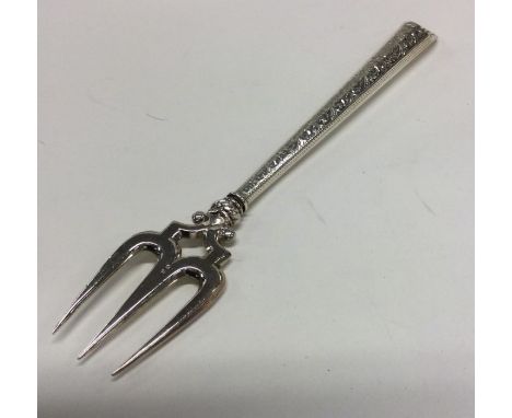 A good tapering silver bread fork with engraved handle. Birmingham 1898. By AL Ltd. Approx. 41 grams. Est. £40 - £60.