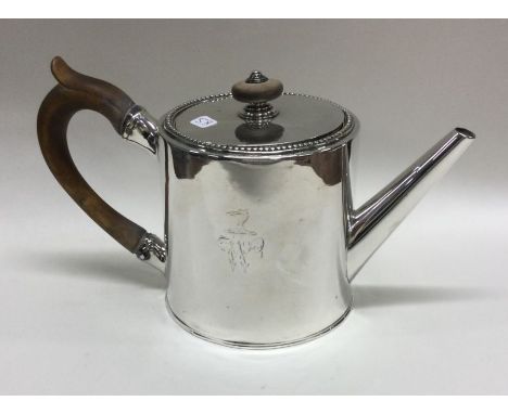 A rare Georgian silver drum teapot with beaded border. London 1775. By AF. Approx. 379 grams. Est. £400 - £500.