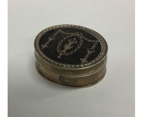 A silver and tortoiseshell ring box with inlaid decoration. London. By WC. Approx. 58 grams. Est. £60 - £80.