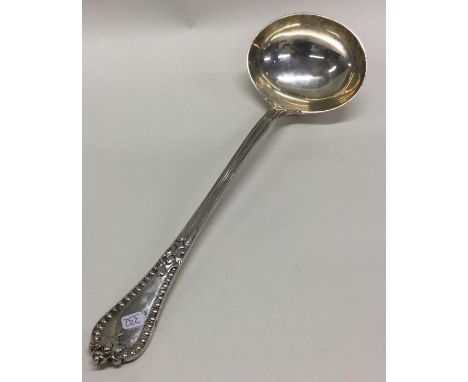 A heavy Grecian pattern silver soup ladle. London 1862. By GA. Approx. 309 grams. Est. £200 - £300.