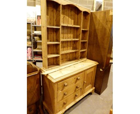 Antique heavy pine kitchen dresser with single cupboard three drawer and multi shelf display top, 205 x 124