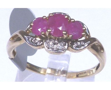 9 ct gold ruby and diamond cluster ring, size T