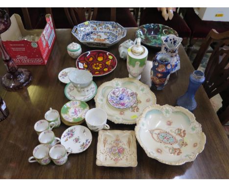 A Poole Pottery Delphis range plate, 20 cm diameter, a lustre blue glass vase with silver rim, a Minton part coffee service a