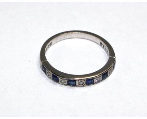 An eleven stone sapphire and diamond half eternity ring set in 18 carat white gold 