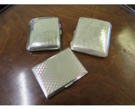 Two silver cheroot cases and an engine turned cigarette case, total weight 255g 