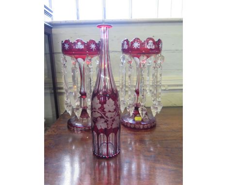A pair of Victorian red overlay glass lustres, with prism shape pendants, 31.5 cm high, and a cameo glass decanter (chipped, 