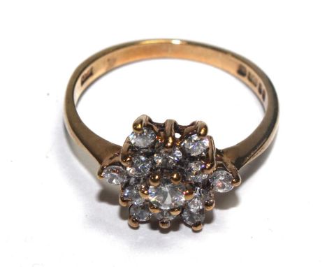 A cubic zirconia ring set in 9 carat gold 