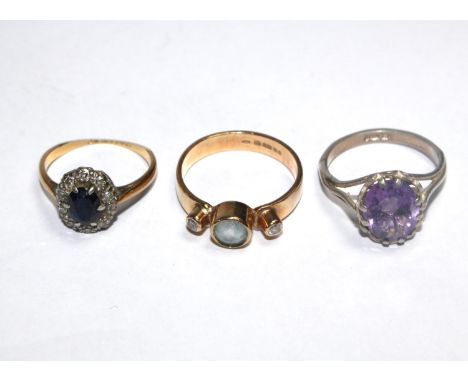 Two gem set rings and a silver ring (3) 