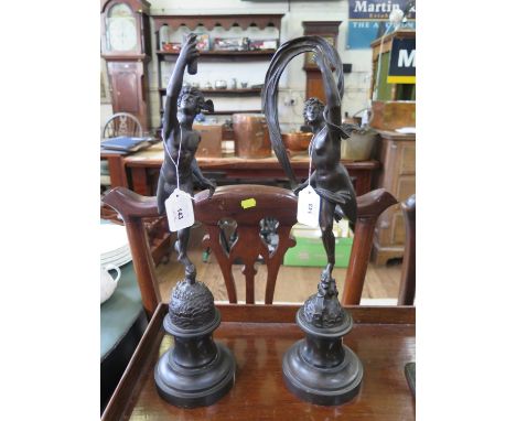 A pair of bronze figures of Mercury and Venus, standing on slate socle bases, total height 45.5 cm high (2) 