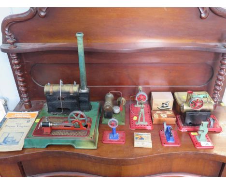 A painted tin plate stationary steam engine 36cm, three small engines, Mamod accessories and three books 