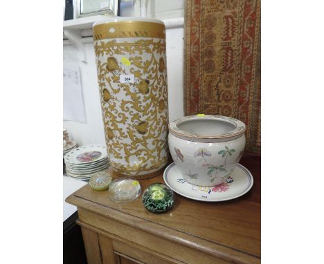 A Poole Pottery plate, with floral design, 26 cm diameter, a gilded ceramic umbrella stand, three paperweights and a bowl 