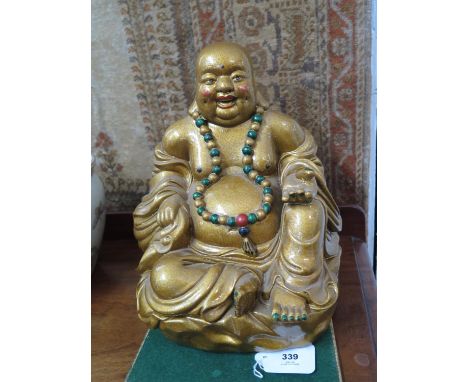 A bronze effect plaster figure of Hotei, 28 cm high 