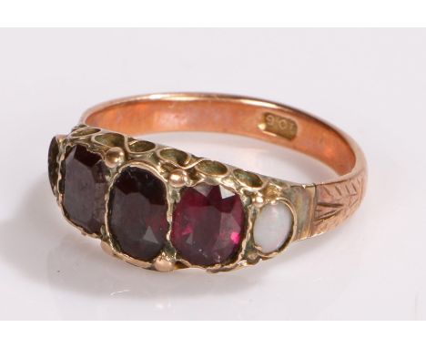 9 carat gold garnet and opal set ring, three garnets and one opal (one opal missing)