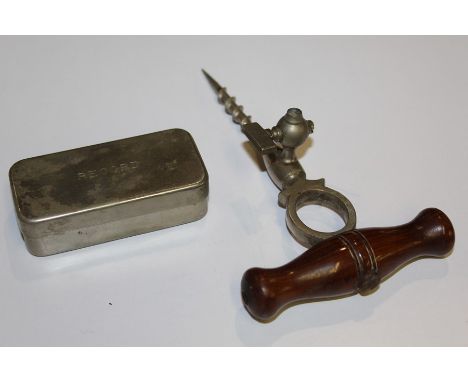 Champagne corkscrew with attached tap and turned wooden handle, record syringe contained in a fitted tin (2)