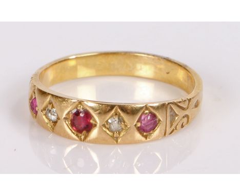 Ruby and diamond set ring, with three round cut rubies and two diamonds, ring size K