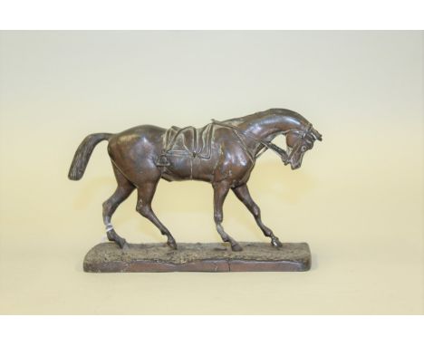 Bronze patinated model of a horse, with a saddle to the back, 16cm long