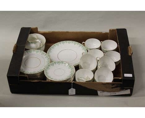Bridgwood tea service, the white ground with tied ribbon and harebell green transfer decoration and gilt borders, place setti