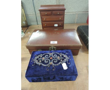A vintage leather case and two jewellery boxes