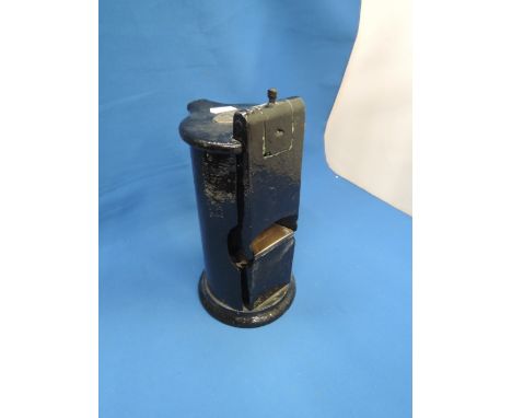 A cast metal railway ticket stamping machine, stamped GNR 